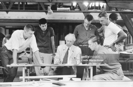 American architect Frank Lloyd Wright (1867-1959) looks over a drawing with his assistants at the Hillside Drafting Studio on the Wright's Taliesin Estate near Spring Green, Wisconsin, c. 1957. (Photo by ? Marvin Koner/CORBIS/Corbis via Getty Images)