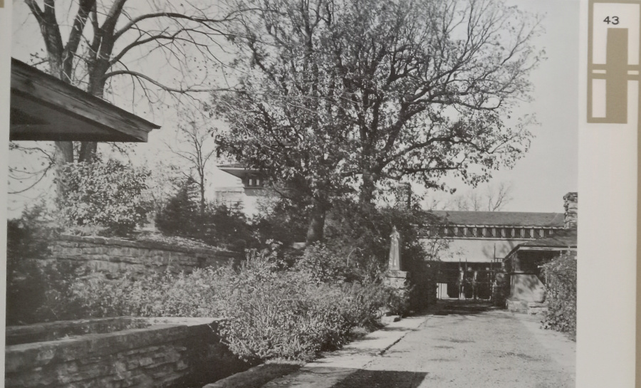 Black and white photograph taken at Taliesin circa 1921 looking west in summer. Two horses in background. Published in the book published in 1925 known as the "Wendingen". Photograph is on page 43.